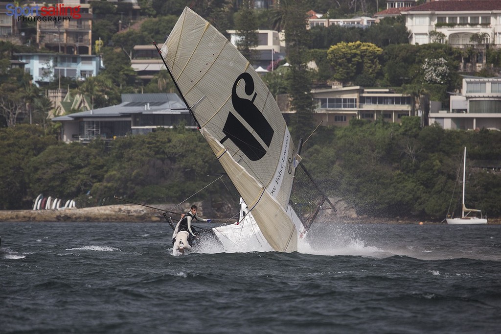 Thurlow Fisher Lawyer’s spectacular capsize  - 18ft Skiff JJ Giltinan Championships2013 - Race 7 © Beth Morley - Sport Sailing Photography http://www.sportsailingphotography.com